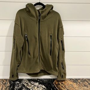 Tactical Series Fleece Jacket with hood. Zipper pockets and Velcro for patches.